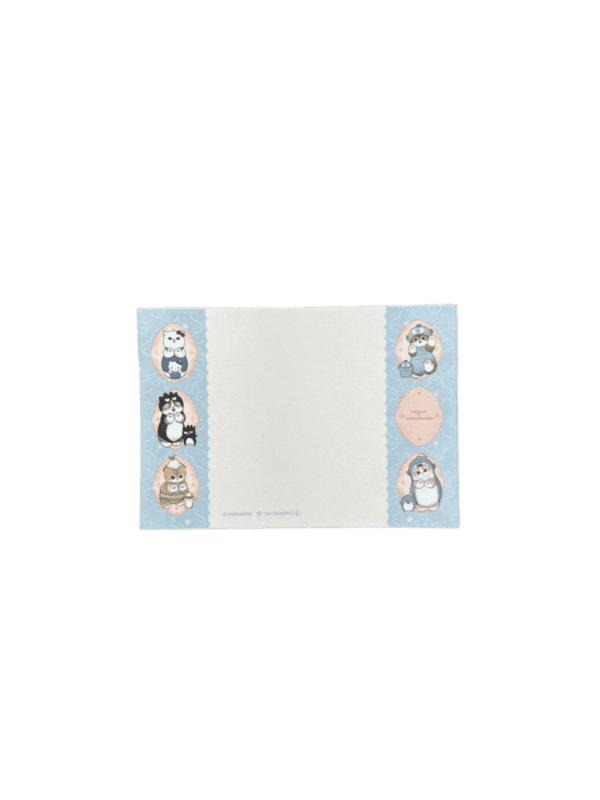 Horizontal memo sheet featuring a large white writing area in the center flanked by light blue side borders. The blue borders contain small framed portraits of mofusand cats wearing Sanrio character costumes, including Hello Kitty, Badtz-Maru, Keroppi, Hangyodon, and Tuxedosam.