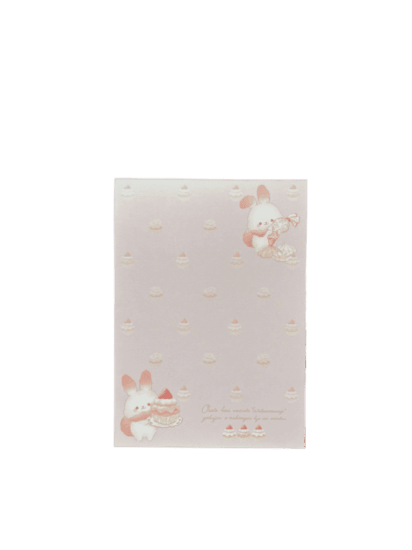 Pink patterned memo sheet decorated with mini cake motifs, featuring Sugar Cocomuu holding a sweet treat in the top-right and bottom-left corners.