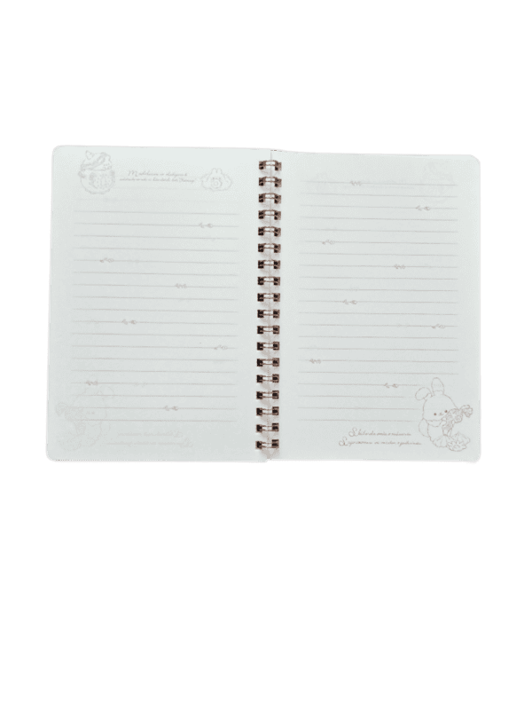 Open spiral notebook showing lined white pages decorated with light grey character illustrations of Sugar Cocomuu in the corners and tiny floral accents along the ruling.
