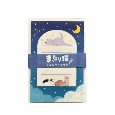 Front view of the World Craft Chilling Cat mini letter set featuring night-sky-themed writing paper with cats under a crescent moon, bound by a blue paper belly band.